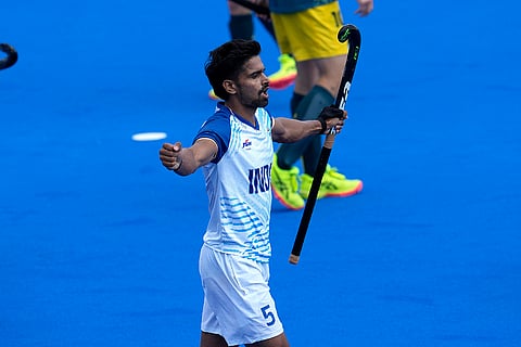 India's Abhishek celebrates after scoring his side's opening goal